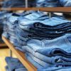 jeans on shelves in a clothing store