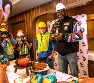 Shaquille O'Neal hold sandwich that will be served at his restaurant at UBS Arena in Elmont, New York