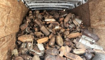 Seized catalytic converters in a van outside police headquarters in Mineola, New York