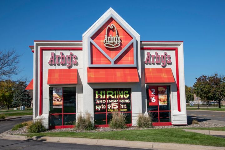 Plymouth, Minnesota, Arby's restaurant with a hiring sign in the window and paying up to 15 dollars an hour.