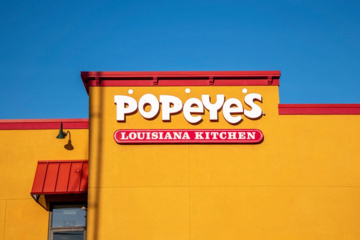 Lansing, Kansas. Exterior of Popeye's Louisiana Kitchen serving chicken, red beans and rice, Cajun fries, and other southern dishes.