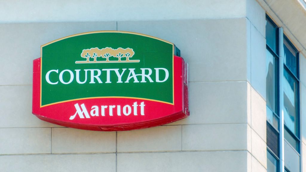 Toronto, Canada, The Courtyard Marriot logo and symbol on a building facade. No people are in the scene.