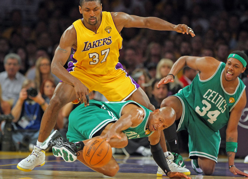 (061710 Los Angeles, CA) Boston Celtics guard Ray Allen and forward Paul Pierce and Los Angeles Lakers forward Ron Artest go after a loose ball during the first quarter of Game 7 of the NBA Finals at the Staples Center Thursday, June 17, 2010. Staf
