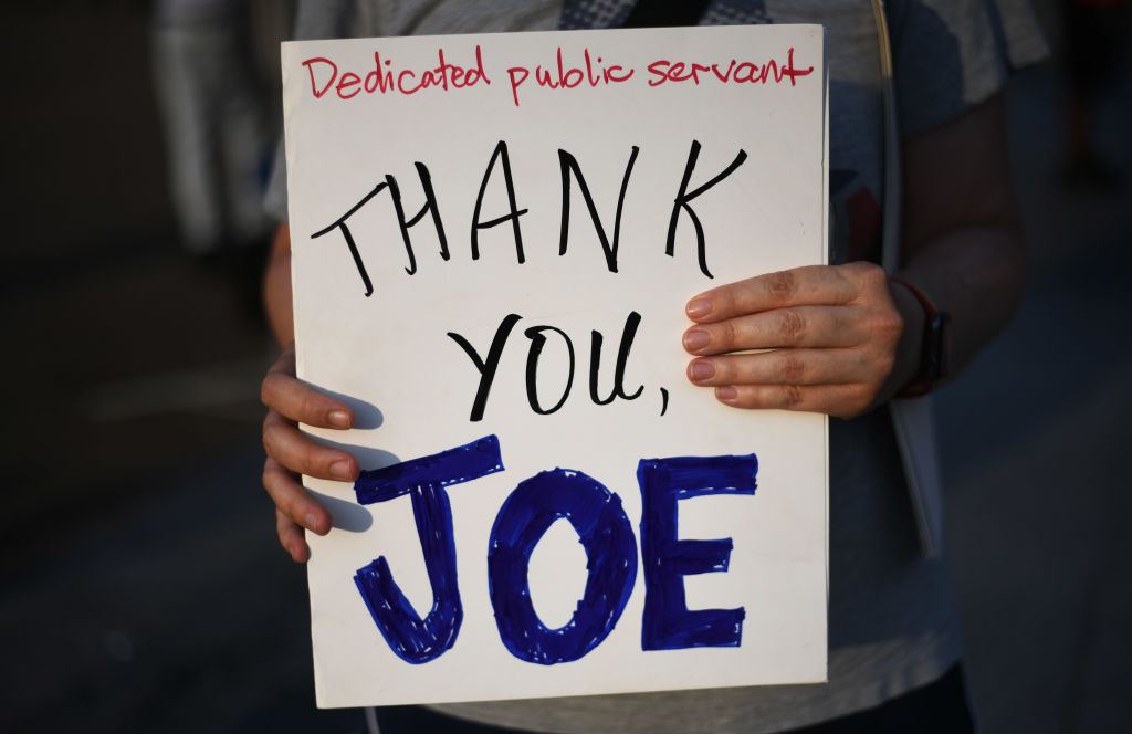 WASHINGTON, D.C., JULY 21: People react to President Joe Biden'