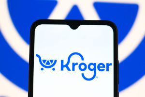 In this photo illustration, the Kroger logo is seen...