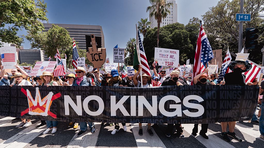 NO KINGS Immigration Protest shows all races protesting ICE raids of Trump Administration feature colorful signs in downtown Los Angeles, CA.