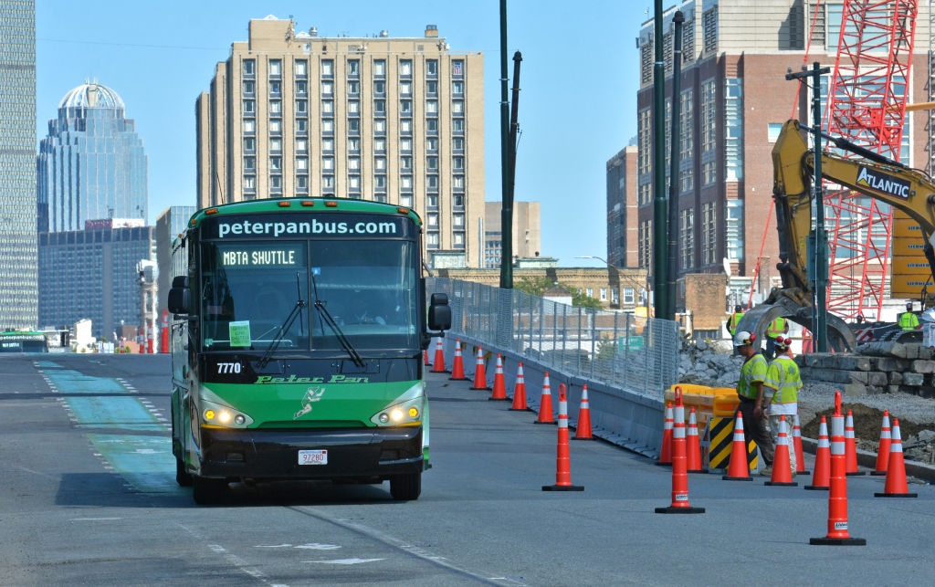 (Boston, Ma 073017) Peter Pan buses are used as MBTA shuttles during the demolition of the Commonwealth Avenue bridge. July 30, 2017 Staff photo by Chris Christo