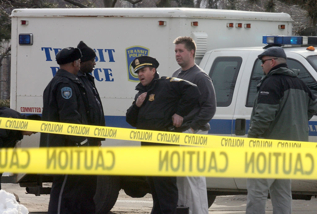 (030107 Boston, MA) TRANSIT POLICE INVESTIGATE STABBING - Three people were stabbed on Ruggles and Tremont Thursday afternoon. Transit Police taped off several locations along the tracks Thursday, March 01, 2007. Staff photo by Mike Adaskaveg.