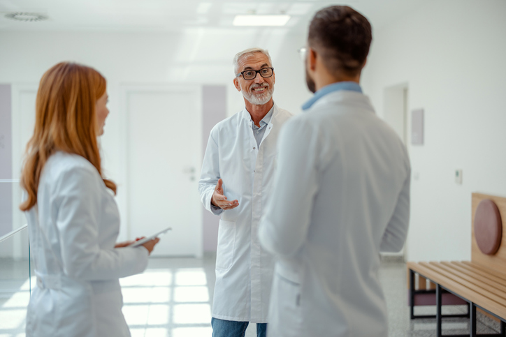 Hospital Meeting With Team of Mixed-Age Doctors