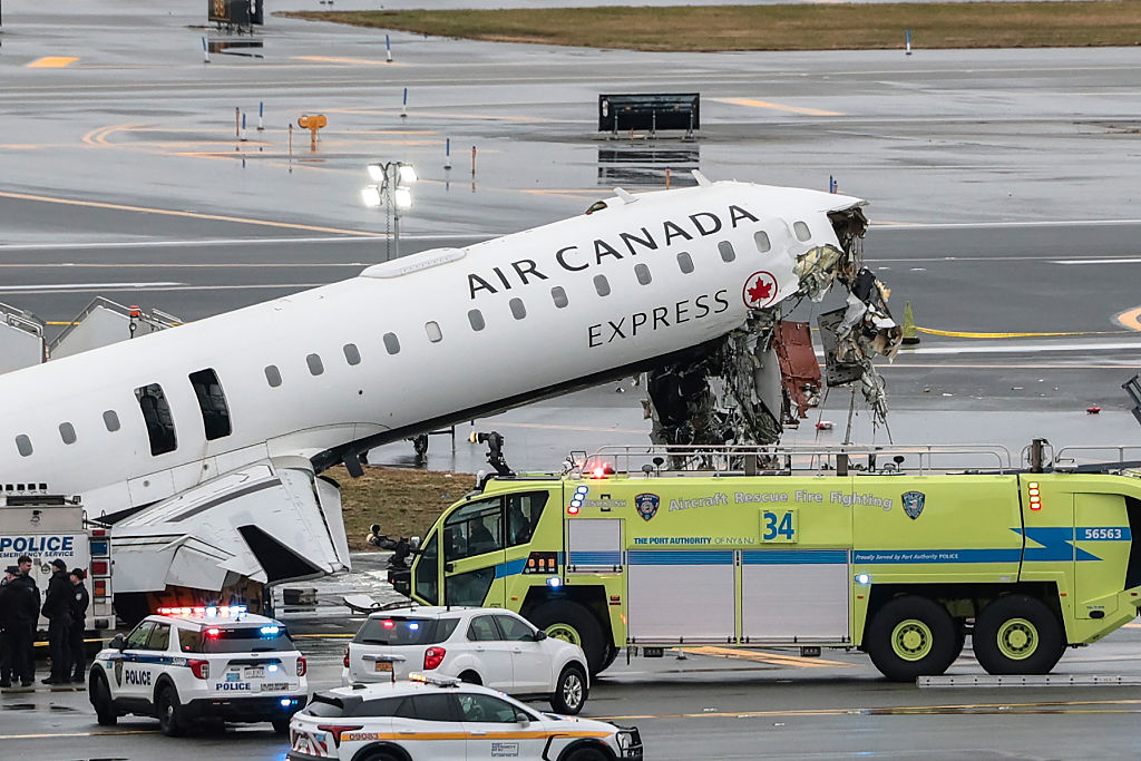 Air Canada Express Plane Collides With Fire Truck At LaGuardia Airport