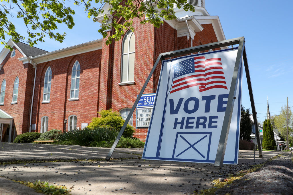 A "vote here" sign is seen outside of the Shiloh United
