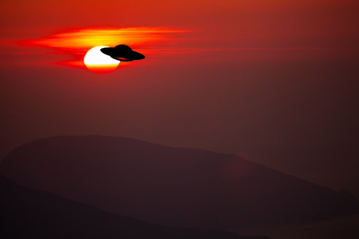 Unidentified flying object in the sky. UFO invasion
