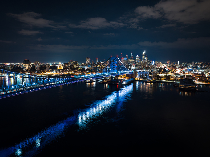 Aerial View of Benjamin Franklin Bridge and Philadelphia Skyline at Night