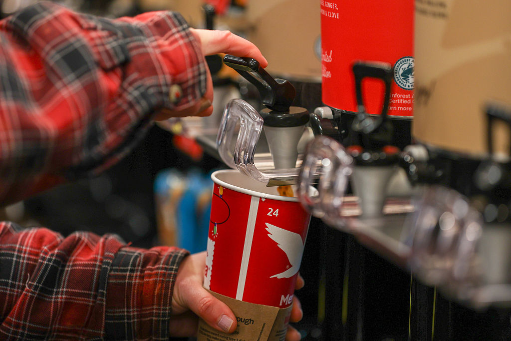 Customers pour hot coffee during the grand opening of Wawa in Wilkes-Barre Township on Friday, December 6, 2024. (Photo by Jason Ardan/The Citizens' Voice via Getty Images)