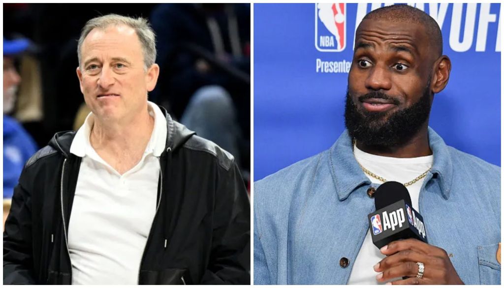 Two men, one with gray hair and a serious expression, the other with a beard and holding a microphone.